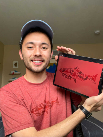AJ Wiley displays the shark graphic he created for the Vapor Apparel X AJ Wiley Collection