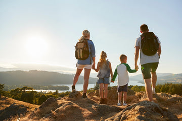 family-hiking-and-admiring-scenery